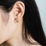 emerald  Snake Earrings - حلق حجر الزمرد