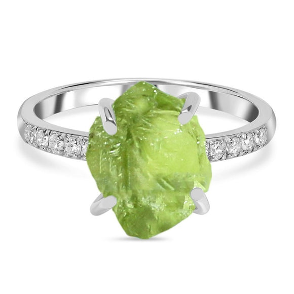 Peridot Raw Crystal & White Topaz Ring  خاتم الزبرجد والتوباز الابيض